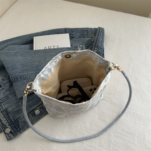 Embroidered bucket bag with butterfly patterns and large capacity interior view