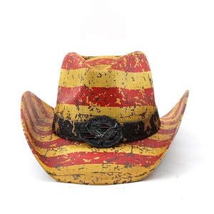 Close-up of vintage American flag straw cowboy hat with metallic eagle emblem