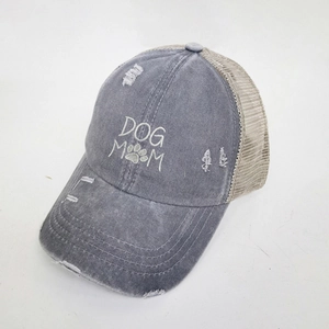 Detailed embroidery of DOG MOM with paw print on distressed gray mesh baseball cap