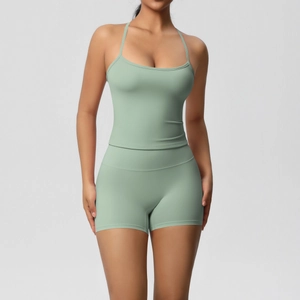 Front view of sage green yoga set showing soft brushed fabric and slim fit design