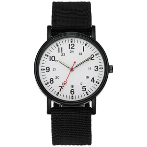 Detailed view of large white dial with 24-hour markers and luminous hands on black nylon watch