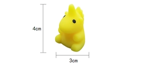 Detailed view showing dimensions of yellow unicorn squishy toy at 4cm height and 3cm width