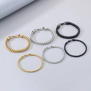 Detailed comparison of gold, silver, and black stainless steel Cuban link bracelets
