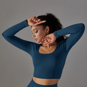 Close-up of seamless dark blue yoga crop top with square neck and honeycomb knit texture