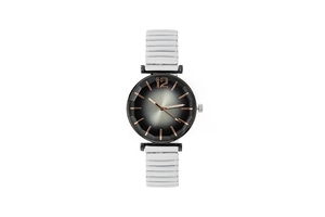 Detailed view of women's quartz watch with black gradient dial and white elastic band