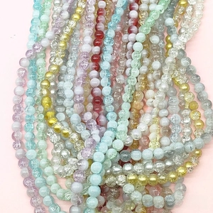 Close-up of 10mm colorful cracked glass beads for DIY jewelry making and bracelets
