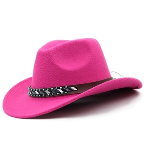 Detailed view of bohemian rose pink felt cowboy hat with beaded ethnic turquoise band