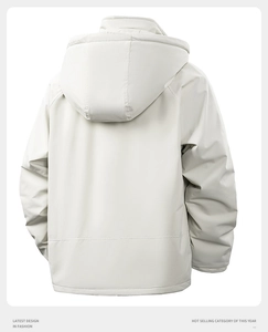 Rear view of a cream hooded windproof jacket with adjustable cuffs and sleek texture