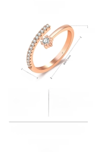 Detailed view of rose gold adjustable open ring with sparkling CZ stone accents