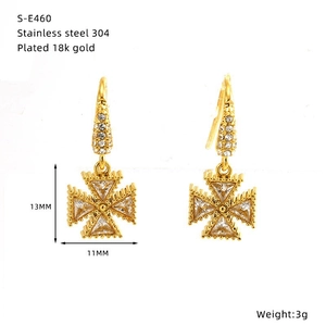 Macro view of cross earrings in 18k gold plated 304 stainless steel with clear zircons