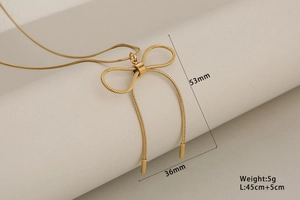 Detail view of gold bow pendant with dimensions 53mm by 36mm and stainless steel chain
