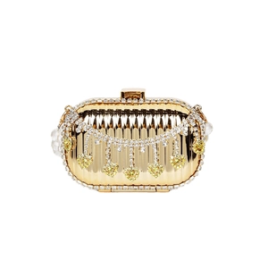 Chic gold acrylic evening bag featuring sparkling rhinestone tassels and heart charms