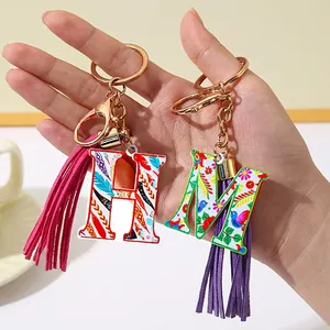 Alphabet Letter Initial Keychain Zinc Alloy Floral Pattern With PU Leather Tassel Bag Charm Boho Style Accessory