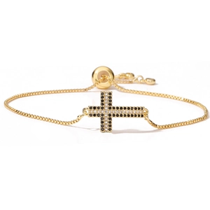 Bracelet minimaliste en plaqué or 18 carats avec croix sertie de zircons noirs et blancs