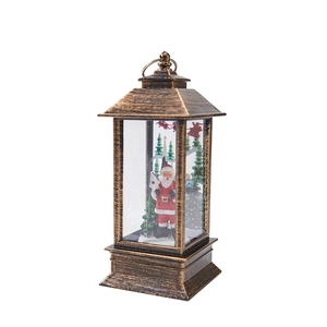 Vintage bronze Christmas lantern with Santa Claus figurine and reindeer silhouette