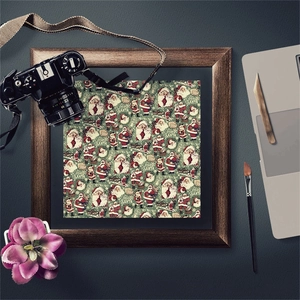Framed vintage Santa Claus scrapbooking paper with retro holiday motifs on dark green base