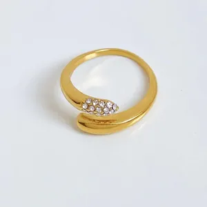 Minimalist gold wrap ring with sparkling white rhinestones and open adjustable design