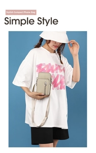 Vertical beige nylon crossbody mobile phone bag with heart zipper detail on model