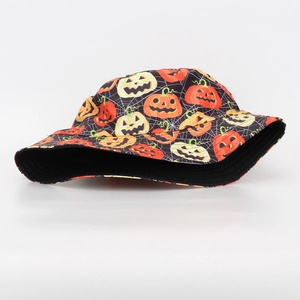 Close-up of Halloween bucket hat featuring orange pumpkin and white spider web prints