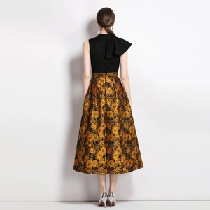 Back view of a vintage jacquard dress with black stand collar and orange-gold flared skirt