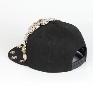 Rear view of black snapback hat with metallic rivets and adjustable buckle strap
