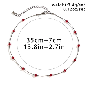 Detailed specs of gothic choker featuring red blood drop beads and measurement details