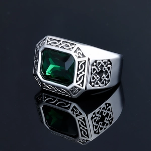 Vintage stainless steel ring featuring a square emerald stone and Celtic knot engravings