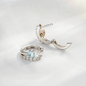 Silver heart-shaped light blue zircon earrings with sparkling crystal accents
