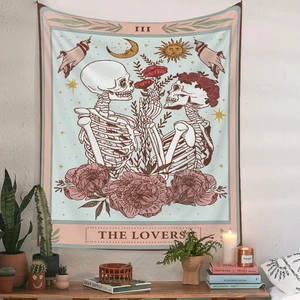 Detail of The Lovers tarot tapestry featuring skeleton lovers with floral motifs on wall