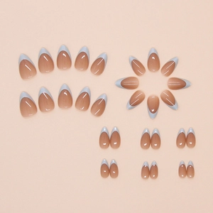 Glossy almond shaped press-on nails with nude pink base and light blue french tips