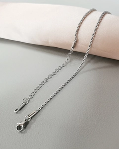 Detail of silver stainless steel twist chain necklace with lobster clasp and extender