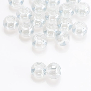 Macro shot of transparent 8x10mm faceted glass beads for DIY jewelry and hair accessories