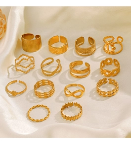 Detailed set of 14 adjustable 18K gold-plated geometric rings on white silk fabric