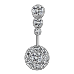 Detailed close-up of a silver belly button ring with sparking round cubic zirconia stones