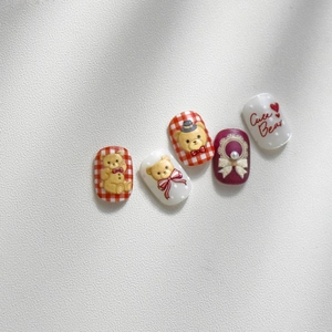 Cute bear relief nail art stickers with red checkerboard and pearl bow decorations