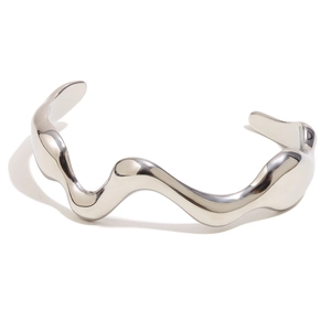 Polished wavy open bangle in silver finish with minimalist organic fluid design