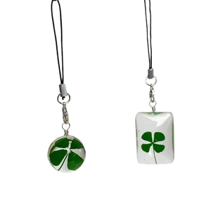 Natural four leaf clover resin pendants with green dried flowers and black lanyards