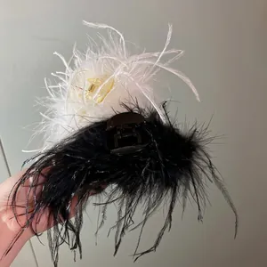 Elegant ostrich feather hair claw clips in black and white colors for women hair styling
