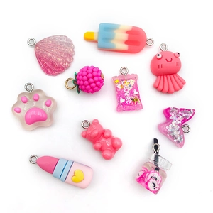 Pink resin pendants set with glitter shells and candy shapes for DIY jewelry making