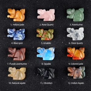 Hand-carved crystal squirrel figurines set in twelve various natural gemstone materials