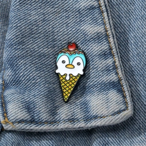 Cute cartoon penguin ice cream enamel pin badge on blue denim jacket collar decoration