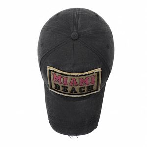 Vintage washed black baseball cap with Miami Beach patch embroidery and distressed details