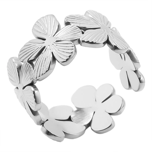 Detailed macro view of adjustable stainless steel ring featuring textured flower petals