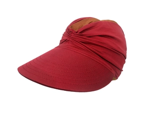 Detail of red sun hat with reinforced multi-layer stitching and textured fabric finish