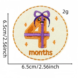 Detail showing cartoon number 4 embroidered patch for baby clothes, 6.5cm diameter
