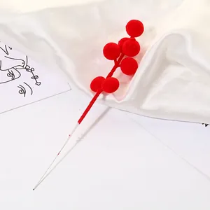 Artificial red berries branch with frosted texture for Christmas tree decoration