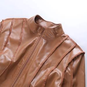 Detail of brown PU leather jacket featuring a stand-up collar and smooth metal zipper