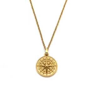 Vintage gold compass pendant necklace in stainless steel for women on white background