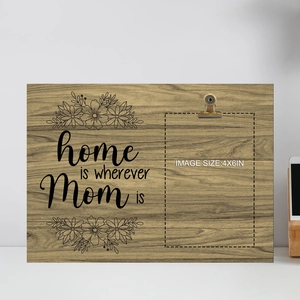 Detail of wooden photo frame for 4x6in pictures with home is wherever Mom is text