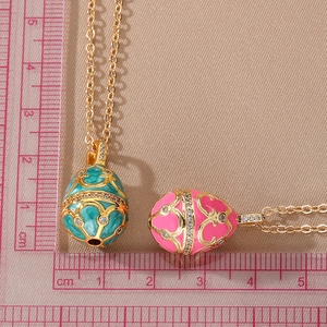 Faberge style enamel egg pendant necklace with colorful zircon in gold plated finish